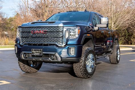 The base Denali offers higher quality interior features, infotainment, and stylings over the Silverado 1500s highest-end trim, the High Country. . 2022 gmc 2500 denali accessories